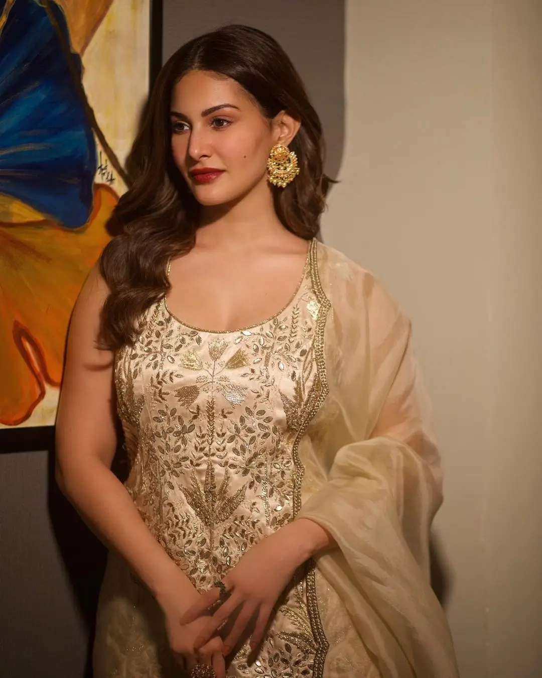 Bollywood Actress Amyra Dastur Stills in White Lehenga Choli